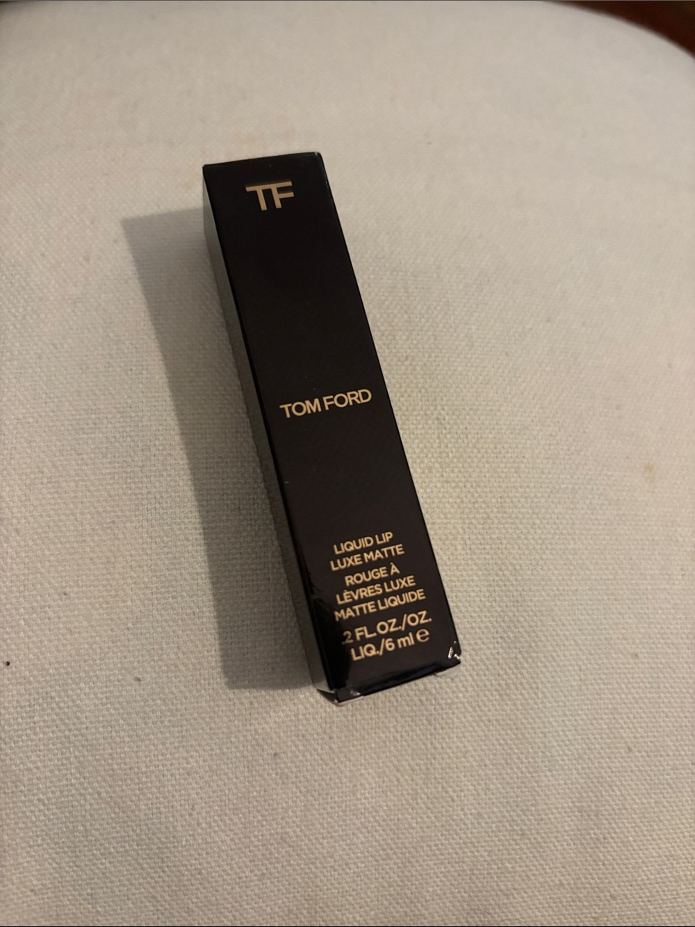 Tom Ford Liquid Lip Luxe Matte in Black and Gold Packaging